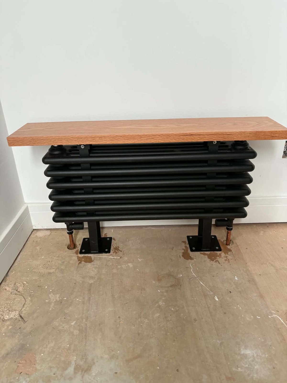 Column radiator with bespoke oak shelf